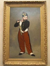 笛を吹く少年